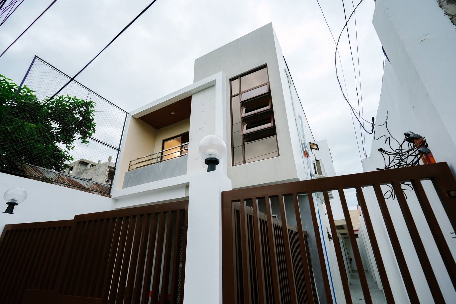 Two-storey residential building by COREN Engineering Services, Calbayog City